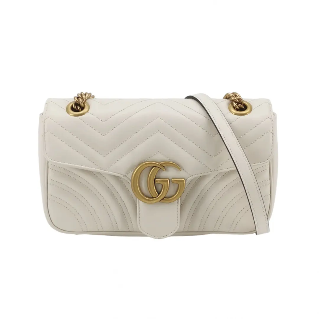 Бежевая кожаная сумка GG Marmont Medium с V-образной стёжкой · фото 1