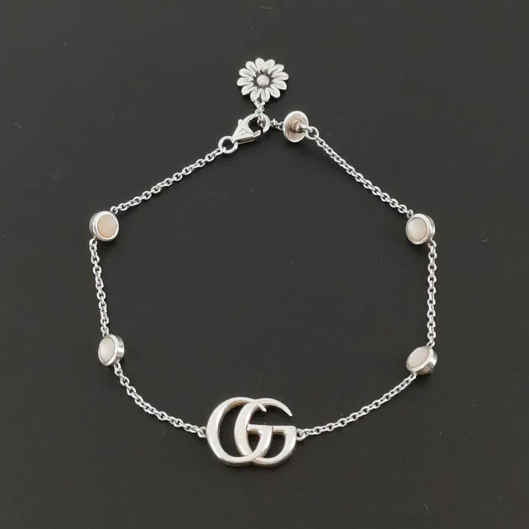 Серебряный браслет GG Marmont с цветами и двойным G · фото 4